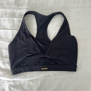 Black Whitney Simmons sports bra